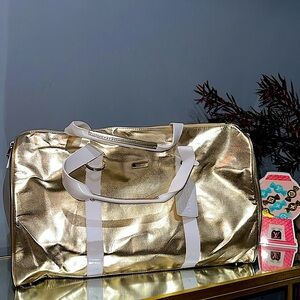 VERSACE PARFUMS METALLIC GOLD DUFFLE BAG, NWOT